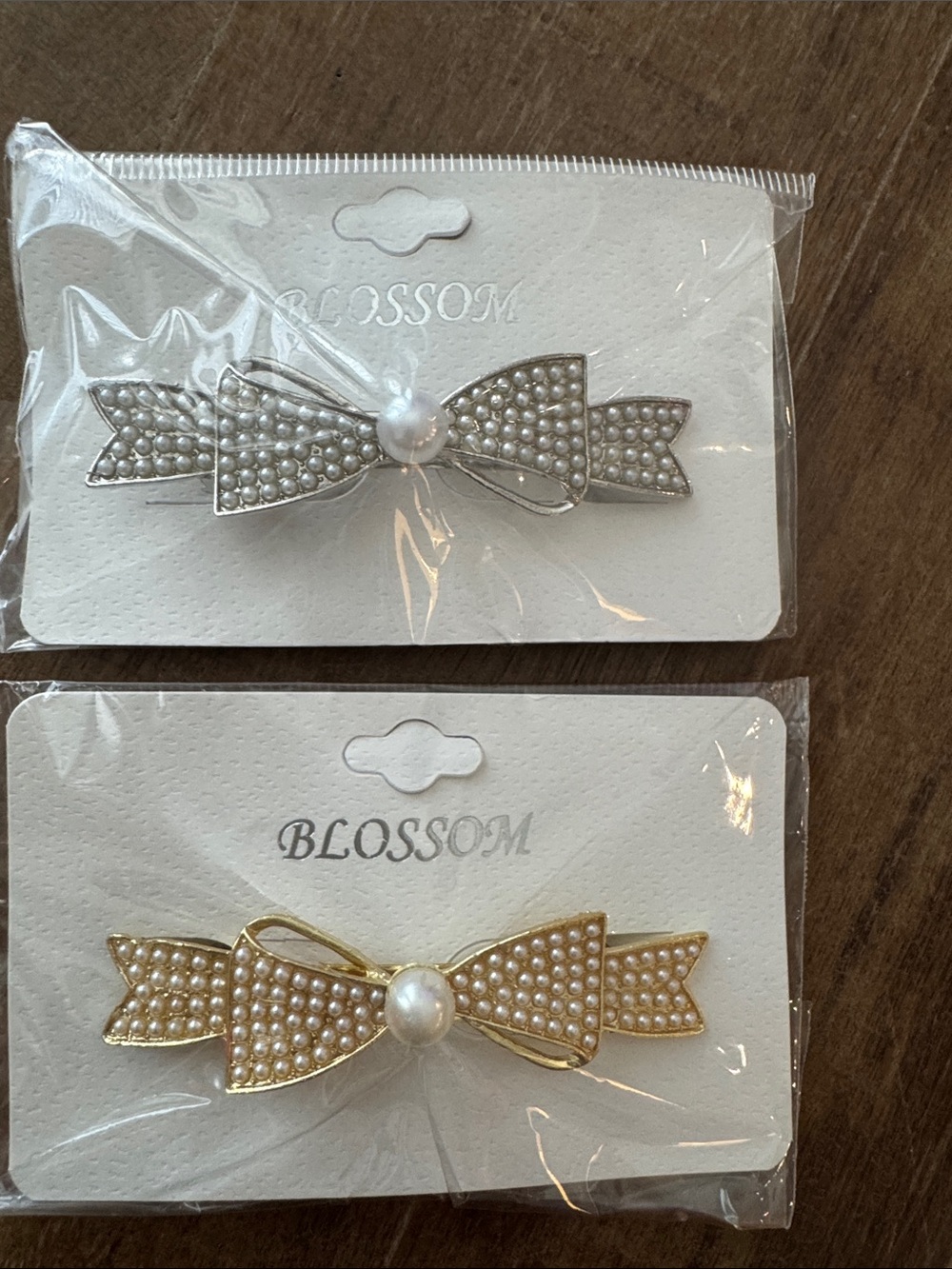 2 pc gold and silver - BOW - metal and faux pearl hair clips.